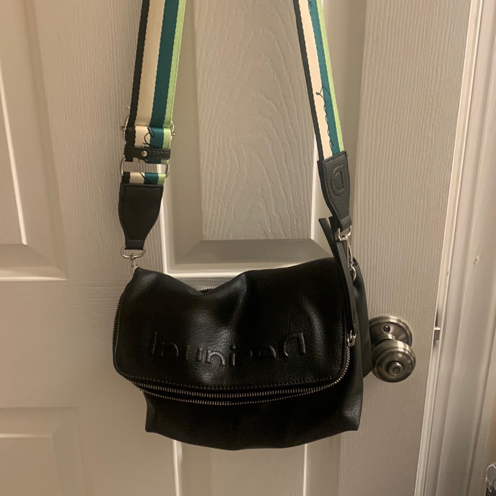 Like knew purse, I bought overseas and I can’t read the brand, lol.